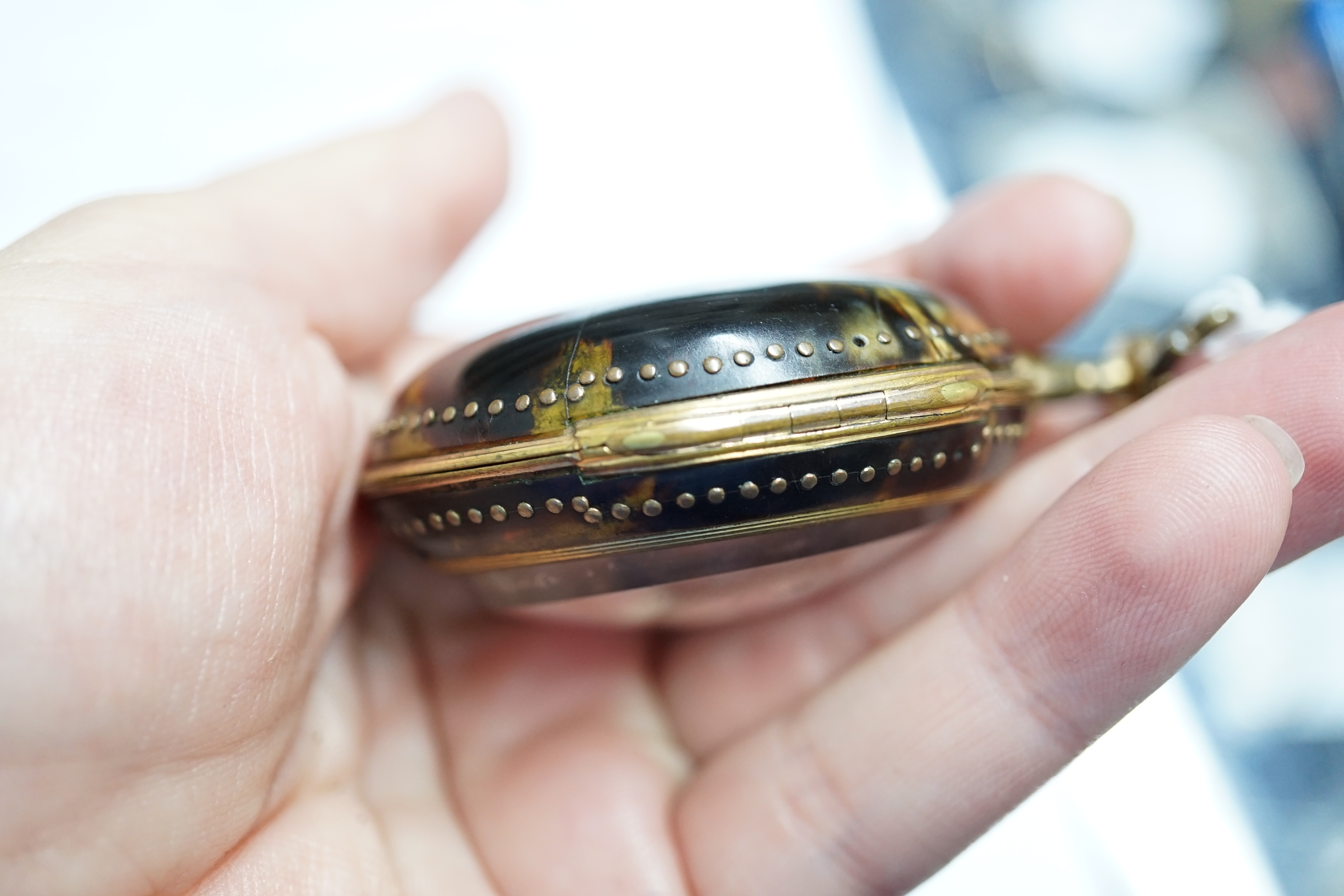 A George III pair cased gold plated keywind verge pocket watch, with a tortoiseshell outer case, by John Rentnow, London